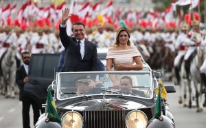 Brazil's new President Jair Bolsonaro waives as he drives past before his swear-in ceremony, in Brasilia, Brazil January 1, 2019. REUTERS/Ricardo Moraes